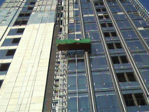 重庆山城幕墙玻璃维修公司更换开窗打胶换胶
