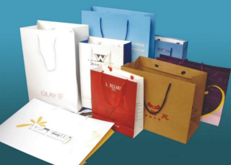 供应广告礼品袋加工定做，服装纸袋设计印刷，企业纸袋供应商图片